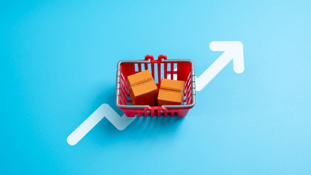 箱詰め商品と上向き矢印が付いたカート