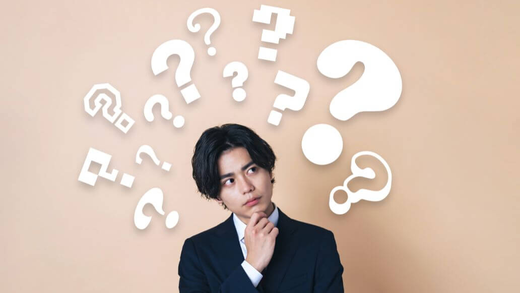 疑問をもつ男性